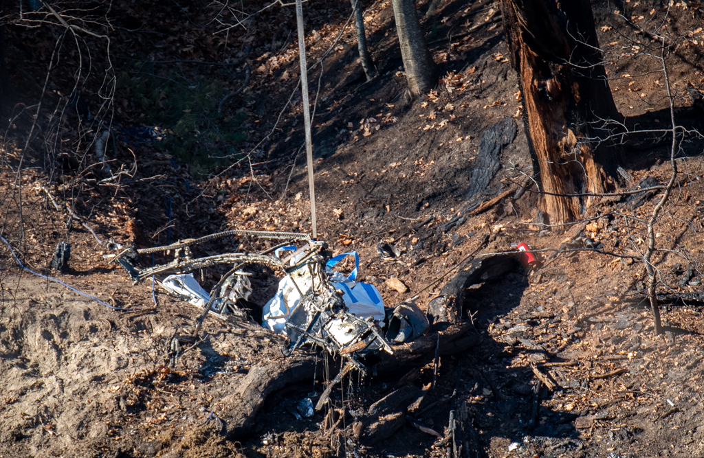 Parts of crashed aircraft being removed from Merrimack River In Bedford